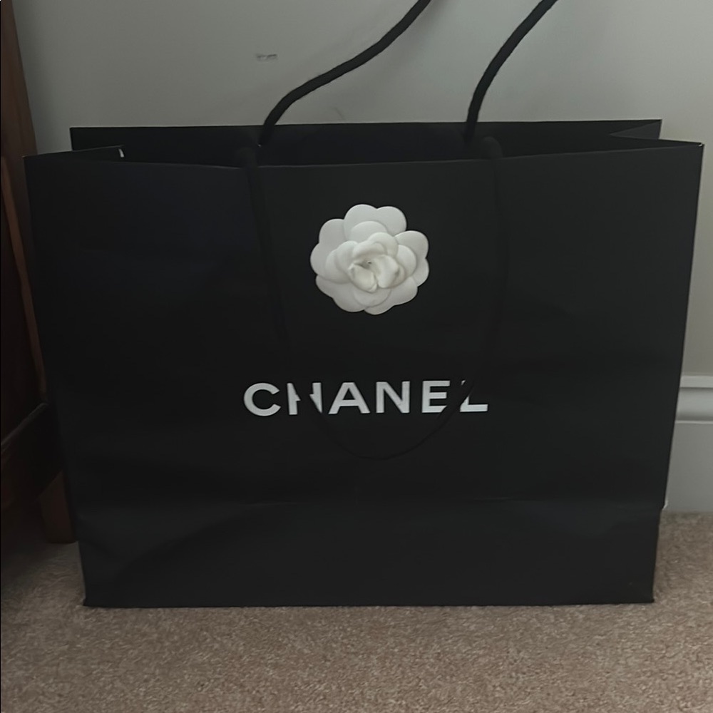 CHANEL Black Bag with White Camellia